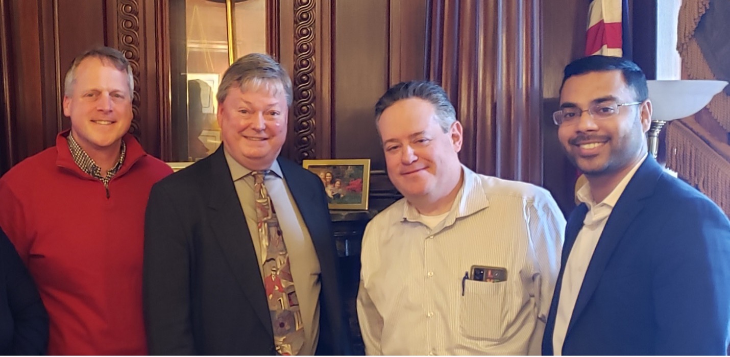 , Carl Berry Executive Director of CRI and President of PA-HCBS, Ted Mowatt Director of PA-HCBS, Secretary of the Budget Uri Monson, and Secretary of Policy and Planning Akbar Hossain